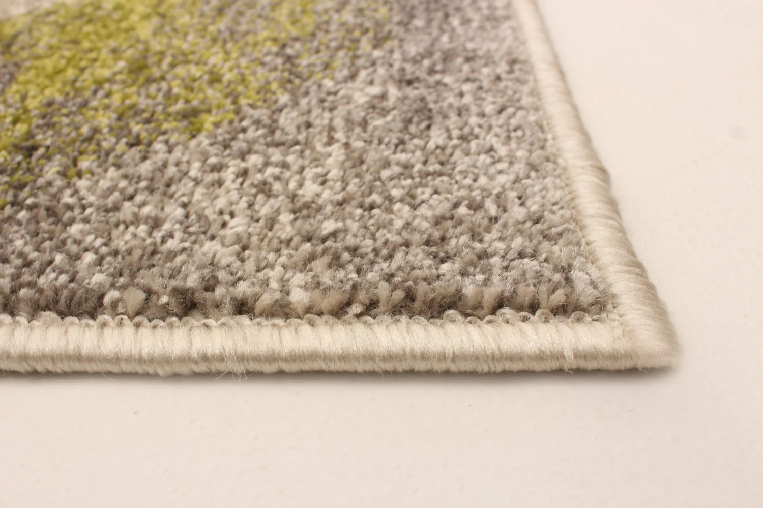 1505-korra-ivory-green-6-7-x-9-6-area-rug-5.webp Korra Ivory / Green 6'7" x 9'6" Area Rug